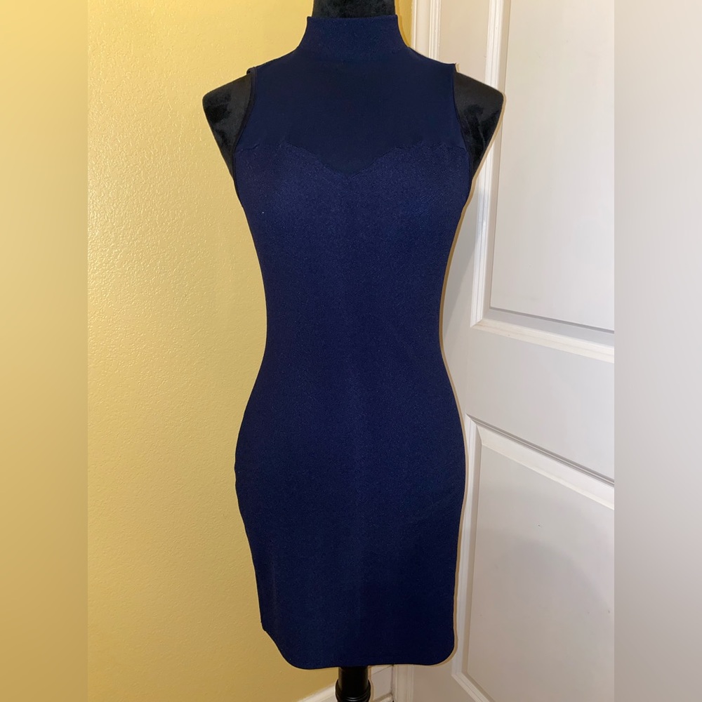 Blue (sparkly) body tight dress. Sleeveless. Small in size. Brand: Bailey blue